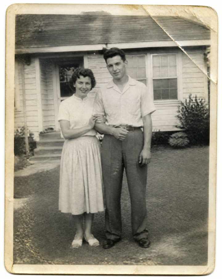 The old print (itself AI-generated for this demo β the couple is not real)